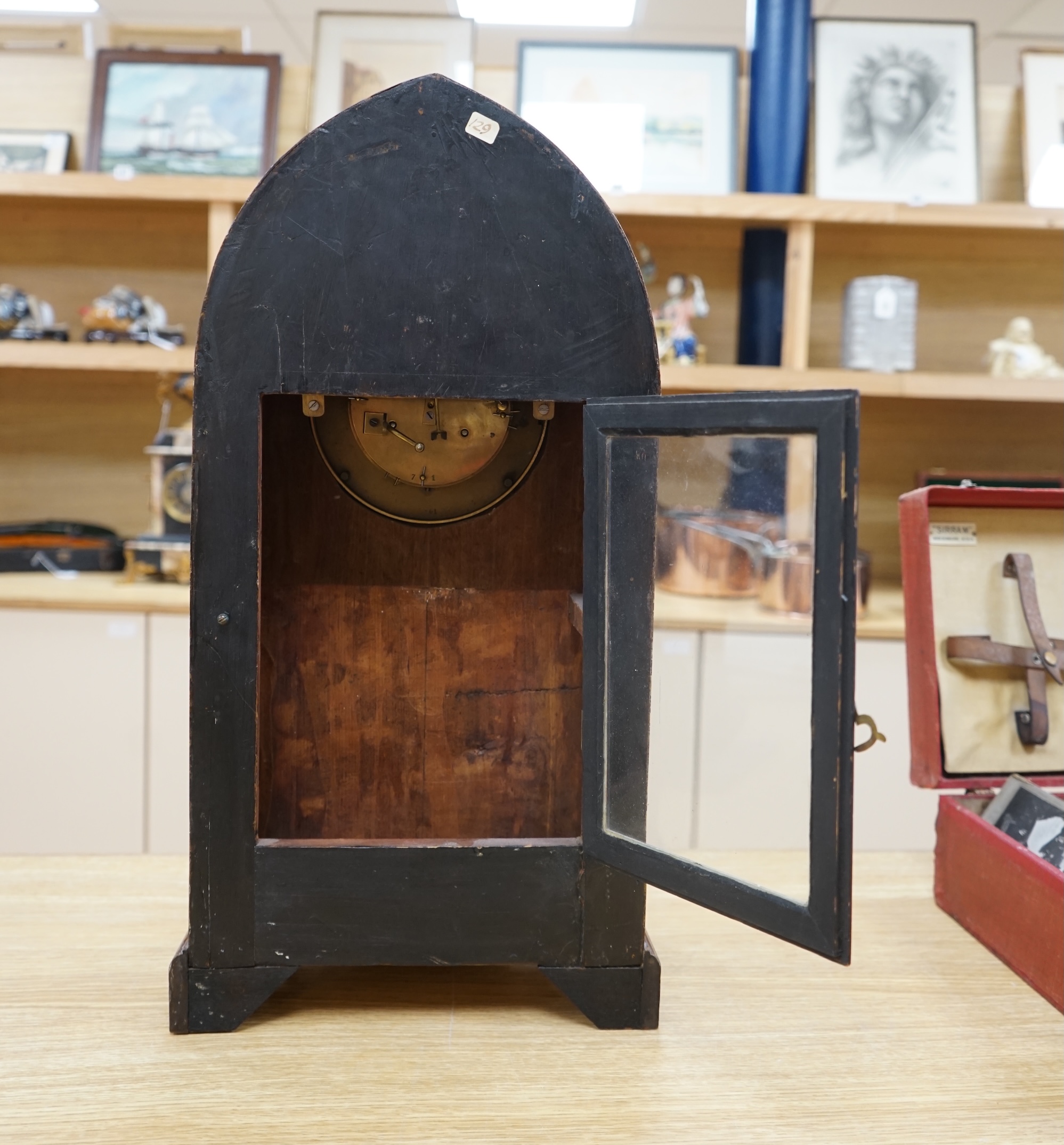 A late 19th century shell inlaid mahogany eight day lancet topped bracket clock, 56cm high. Condition - case good, clock lacking pendulum, untested if working.